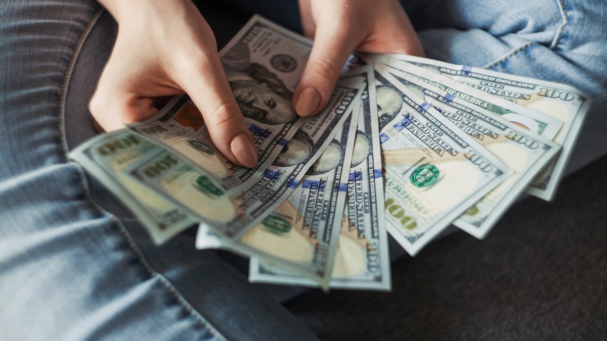 Digital entrepreneur reviewing online business revenue analytics and website monetization metrics